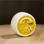 Cacioricotta di capra su tagliere di legno