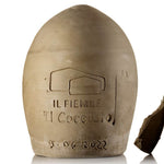 Anfora chiusa di creta con all'interno un caciocavallo